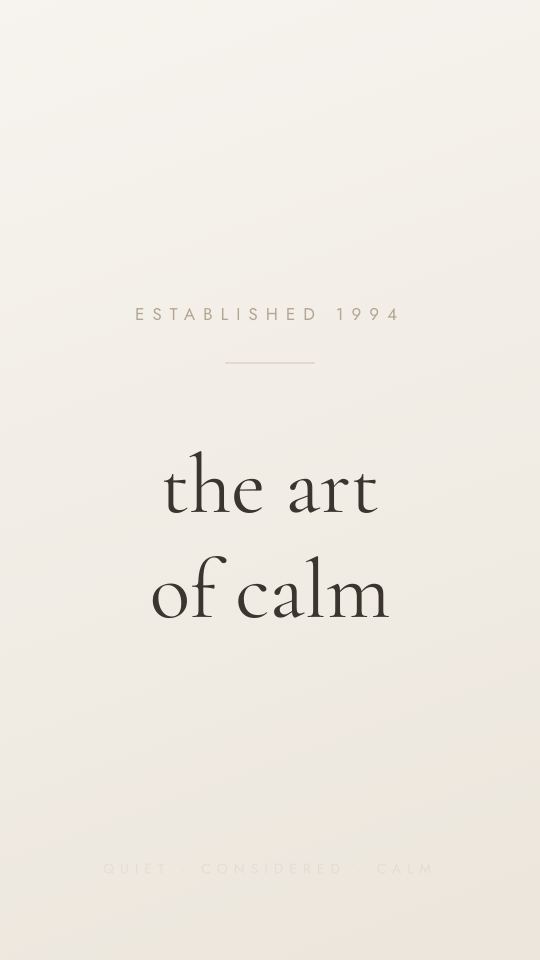 ESTABLISHED 1994 eyebrow over 'the art of calm' on cream.